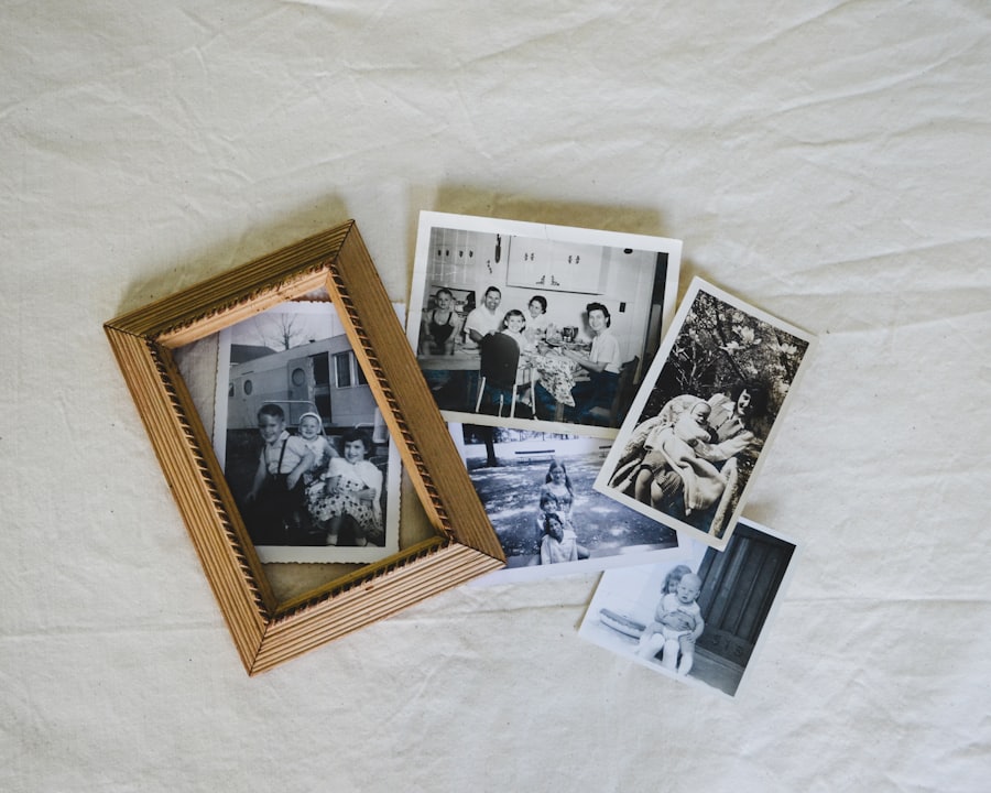 Old framed black and white family prints laid on linen